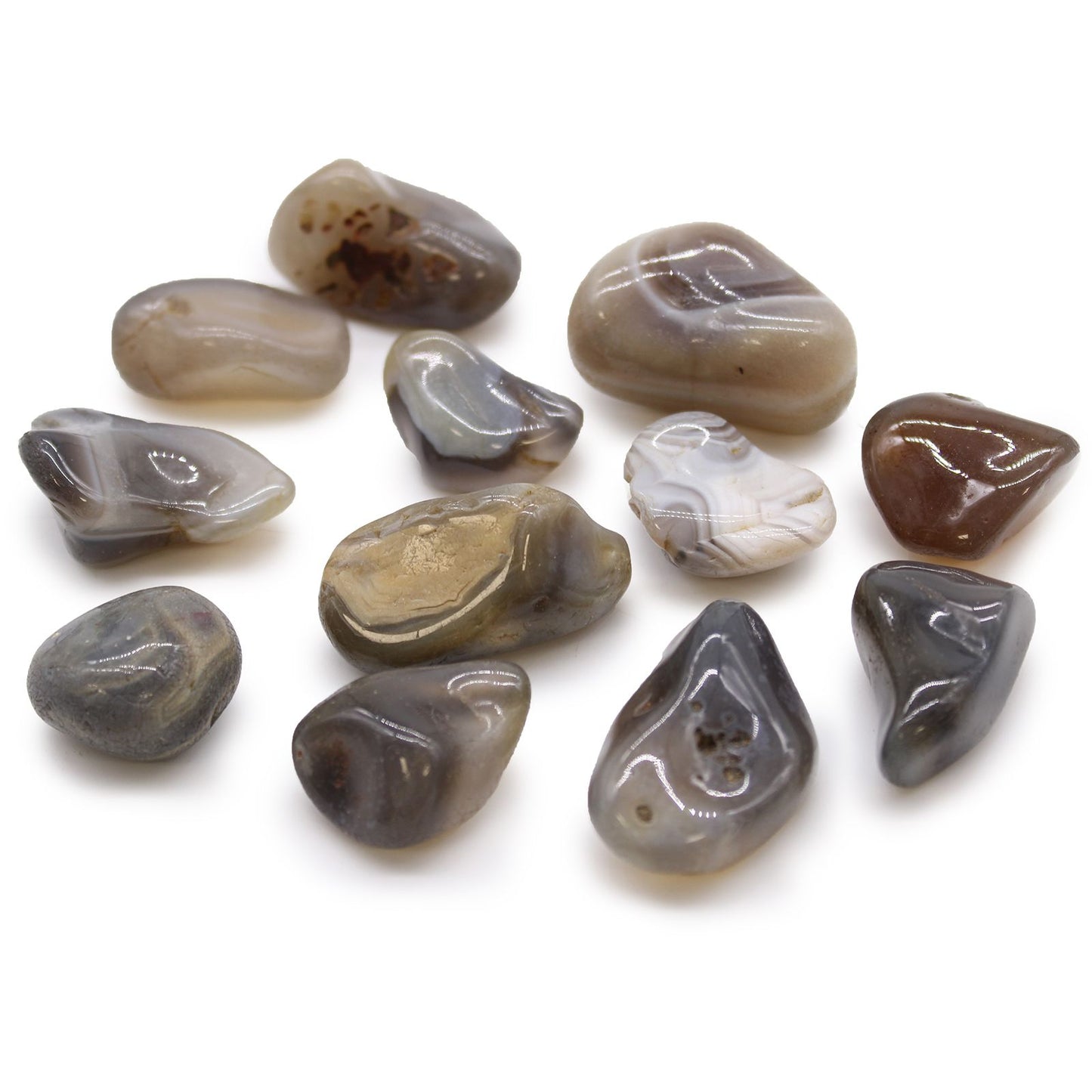 Set mit 12 Trommelsteinen aus grauem Botswana-Achat