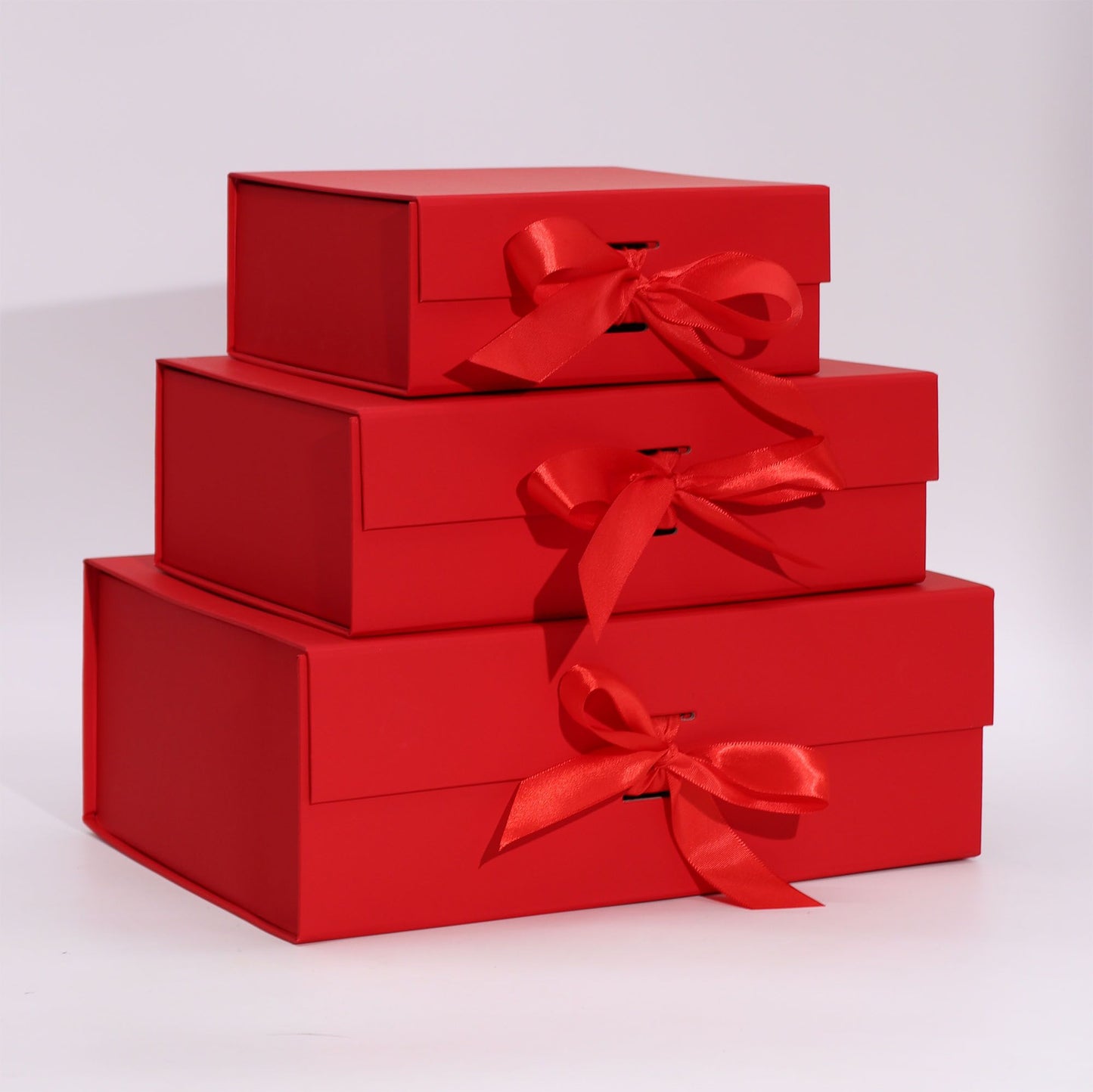 Faltbare Geschenkbox in leuchtendem Rot mit eleganter Schleife