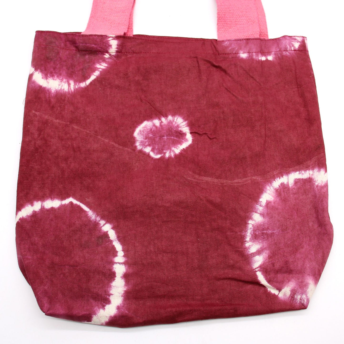 Handgefertigte Batik-Tasche in Maroon-Ringoptik mit Pinkem Griff