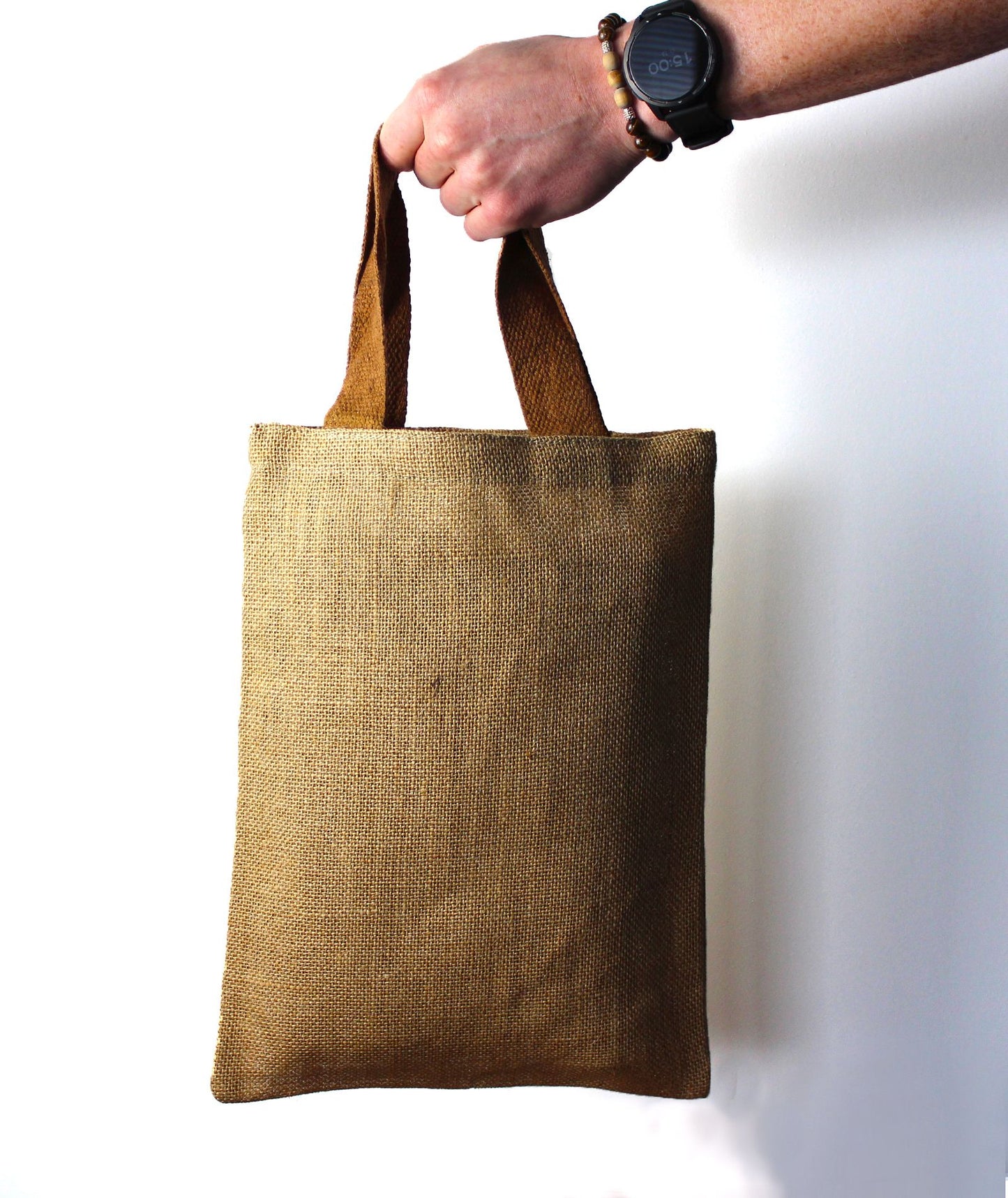 Natürliche Jute-Tragetasche mit lila Griff – Ihr stylischer Eco-Begleiter