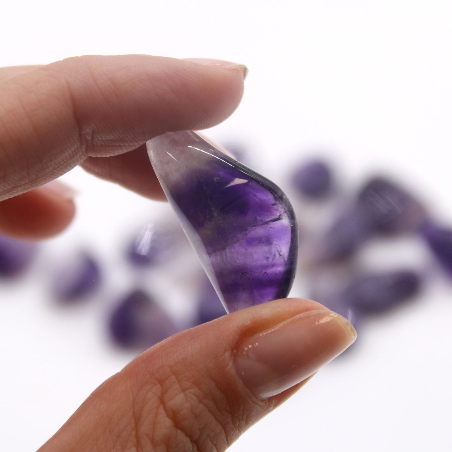 Set mit 24 Trommelsteinen aus gebändertem Amethyst – Natürliche Edelsteine poliert