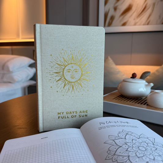 Dankbarkeitstagebuch 'Goldene Sonne' – Elfenbein mit Goldprägung