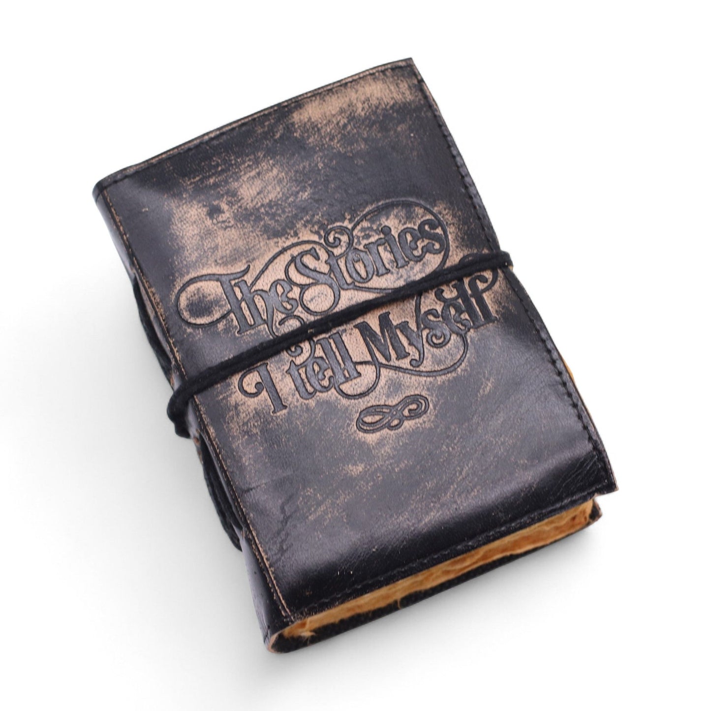 Leder-Notizbuch mit fettkantigen Seiten – The Stories I Tell Myself
